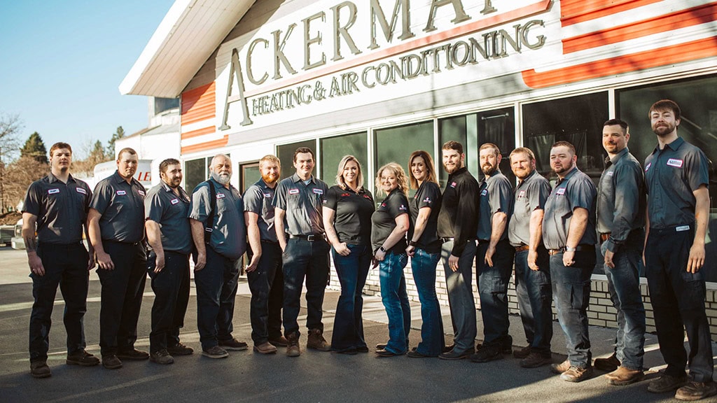 The Ackerman-Nolan Heating, Air Conditioning & Duct Cleaning team outside of their office in Colfax, WA.